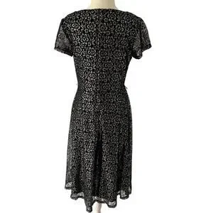 chinese dress ladies Gabby Skye Women's Long Sleeved Round Neck Lace A-line Dress Dress, Black/Navy,  4 at Amazon Women's Clothing store main image 0